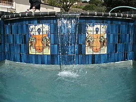 After: Pool tile cleaning — heavy calcium buildup removed
