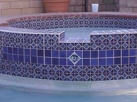 After: Pool waterline tile restored to original condition