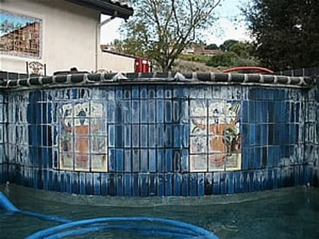 Before: Pool tile cleaning — heavy calcium buildup removed