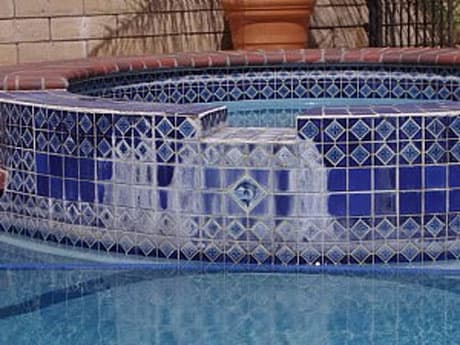 Before: Pool waterline tile restored to original condition