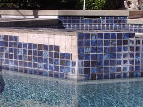 Pool tile before calcium removal